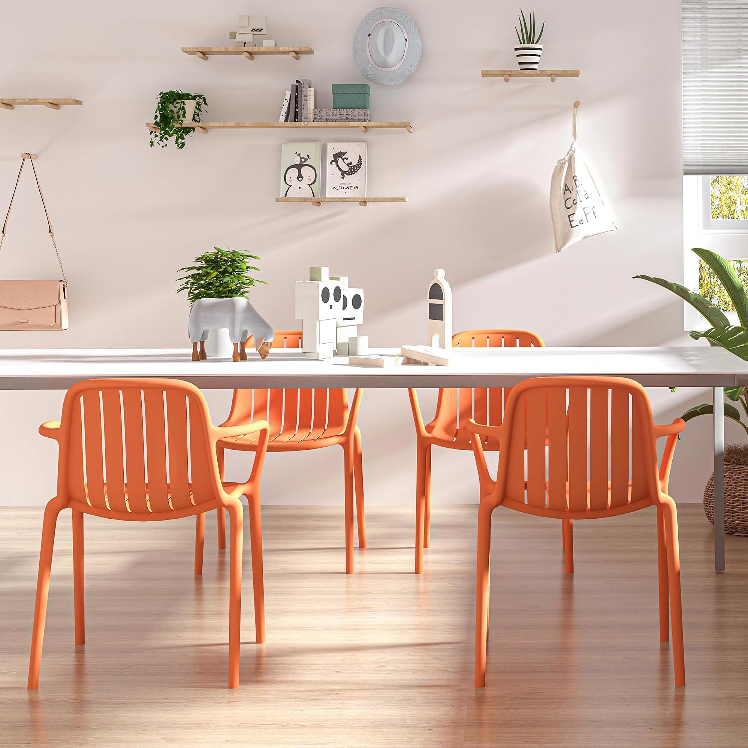 2 Orange Stackable Plastic Patio Chairs